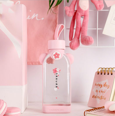 Bouteille en verre mignonne de forme de flamant, bouteille en verre rose avec la douille de silicone fournisseur