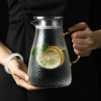 Lanceur en verre de boissons de poignée ronde, lanceur en verre résistant à la chaleur isolé avec le couvercle fournisseur