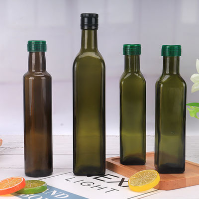 Bouteille en verre d'huile d'olive de 750 ml dans la protection courante de lumière du soleil faite à la machine fournisseur