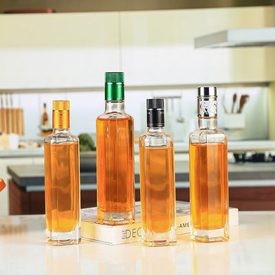 Le vert en verre adapté aux besoins du client d'espace libre de bouteille d'huile de l'olive 500ml/750ml a scellé la forme ronde fournisseur