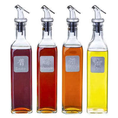 Bouteille vide d'huile d'olive de sauce au vinaigre, bouteille carrée d'huile d'olive avec le distributeur d'huile fournisseur