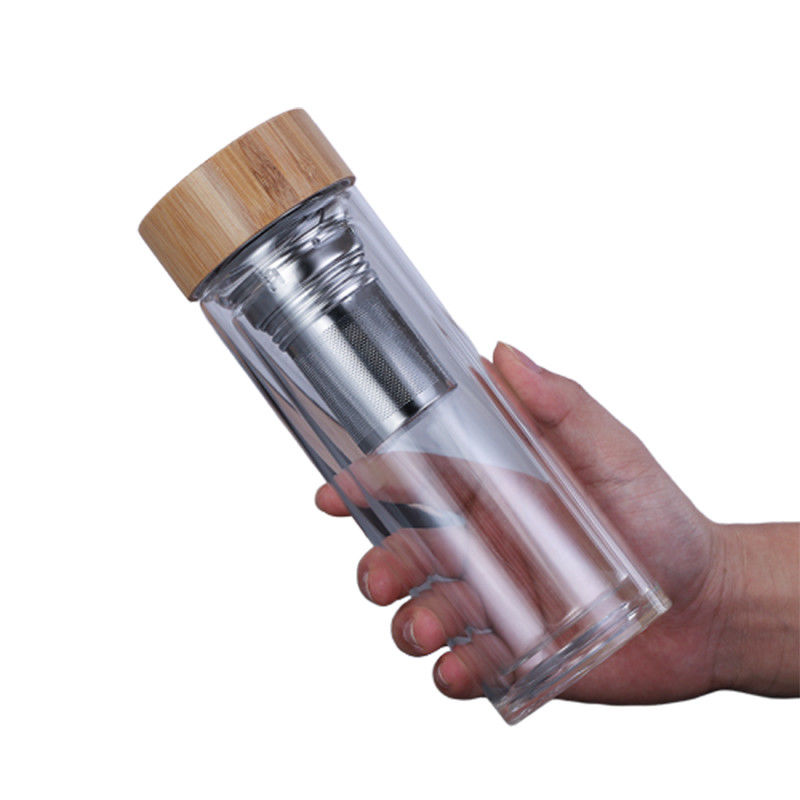 Bouteille en verre adaptée aux besoins du client de Borosilicate, bouteille potable en verre claire avec le couvercle en bambou fournisseur