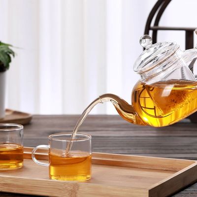 Bouilloire de thé en verre claire à la maison, théière en verre résistante à la chaleur de floraison de feuilles mobiles fournisseur