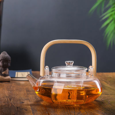 Pot de floraison transparent de thé avec le filtre, tasse de thé soufflée par main réglée avec la bouilloire fournisseur