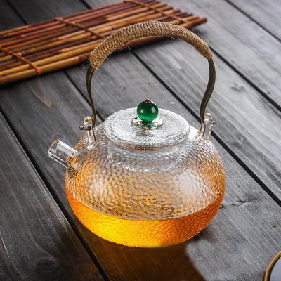 Théière en verre d'espace libre résistant à la chaleur d'émail pour la taille de floraison de coutume de thé/café fournisseur