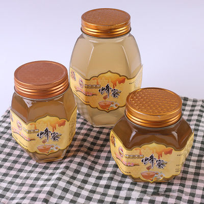 Récipient d'entreposage recyclable de nourriture de miel de couvercle en métal de pot de forme en verre d'hexagone fournisseur
