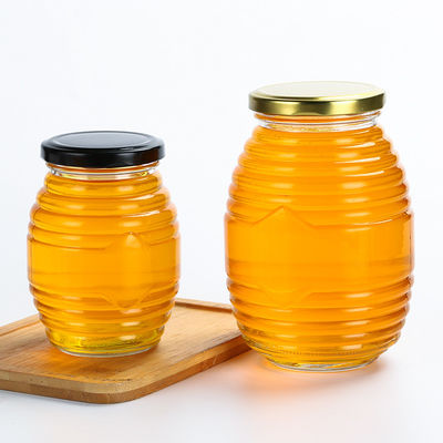 La forme d'abeille peu de pots en verre, aiment fileté autour du pot en verre avec le couvercle fournisseur