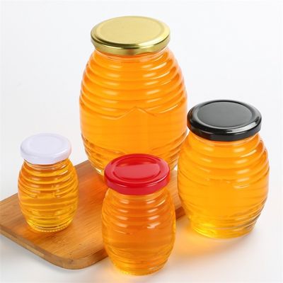 La forme d'abeille peu de pots en verre, aiment fileté autour du pot en verre avec le couvercle fournisseur