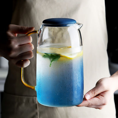 Ensemble en verre coloré de broc de l'eau 1550ml avec 2 tasses pour la boisson glacée de l'eau fournisseur